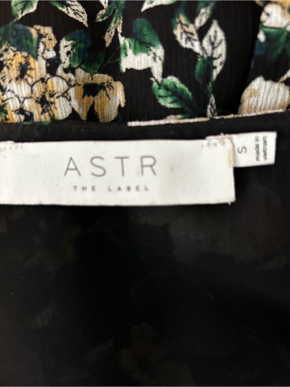 Astr Black Floral V-Neck Midi Dress with White Flowers and Green Leaves - Picture 2 of 8